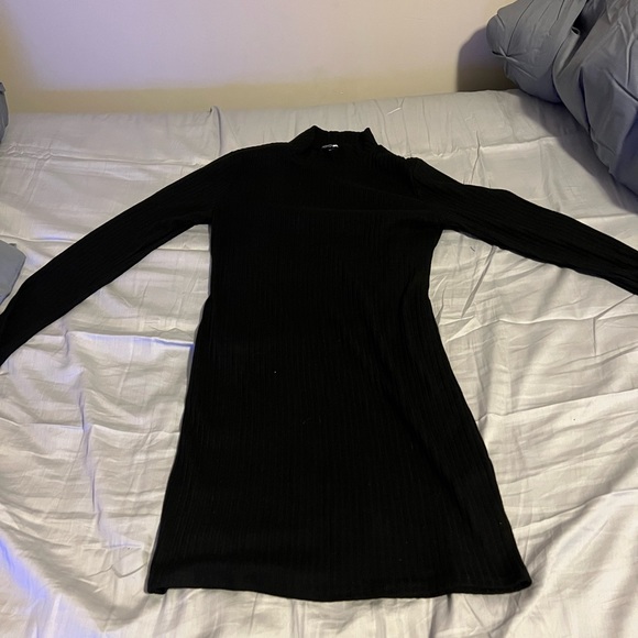This is a black long sleeve, mock neck mini dress - Picture 2 of 3